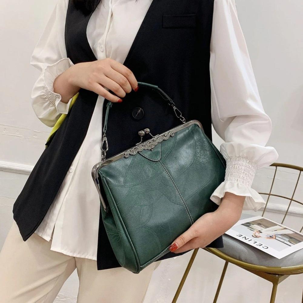 Mila | Timeless vintage bag with an elegant flap closure