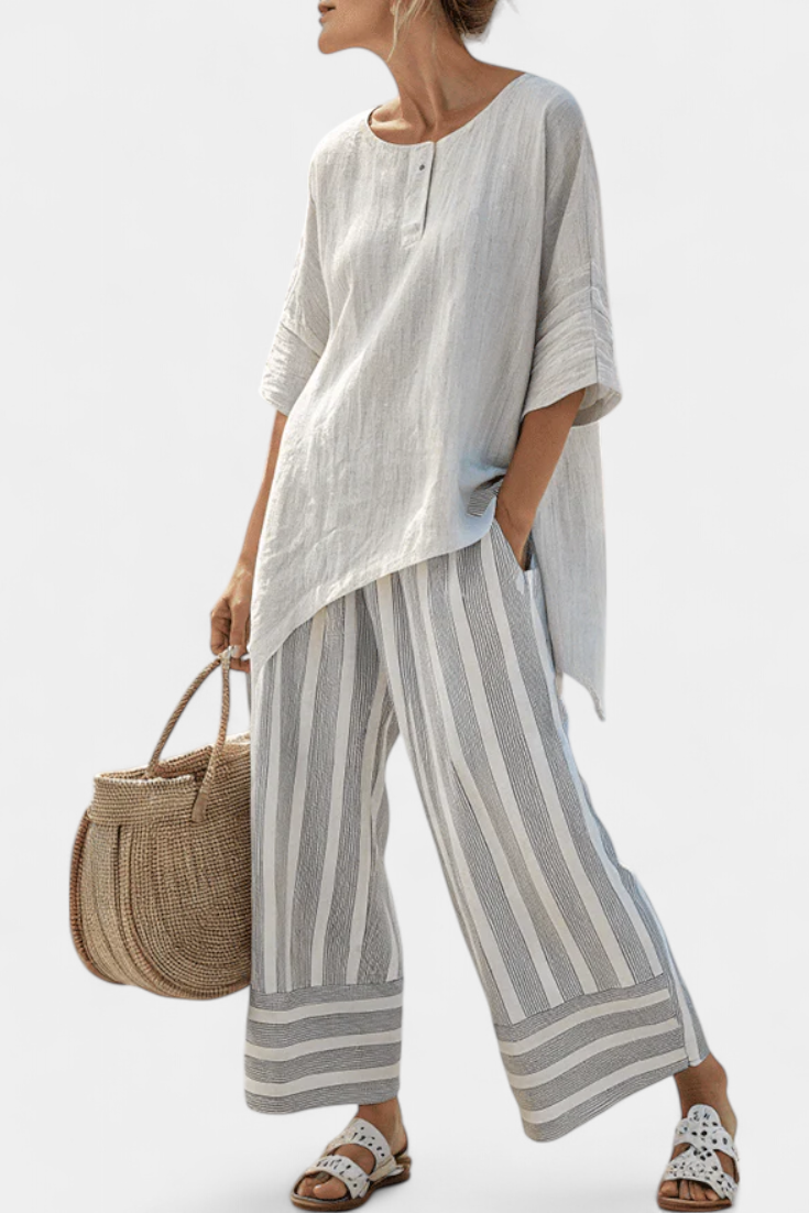 Daisy Set with Asymmetrical Top and Striped Pants for a Modern and Elegant Style