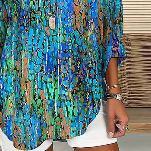 Elise | Super fashionable green blouse with long sleeves and a V-neck