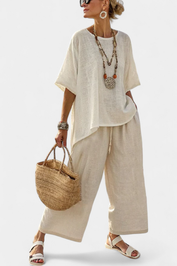 Complete Minimalist Daisy in Raw Tones with an Oversized Top and Wide Pants for a Simple and Elegant Style